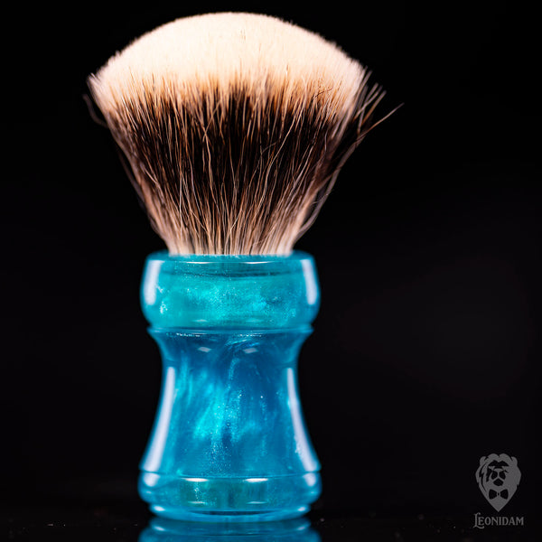 Handmade Shaving Brush "Adrion" in polished light blue and silver resin.